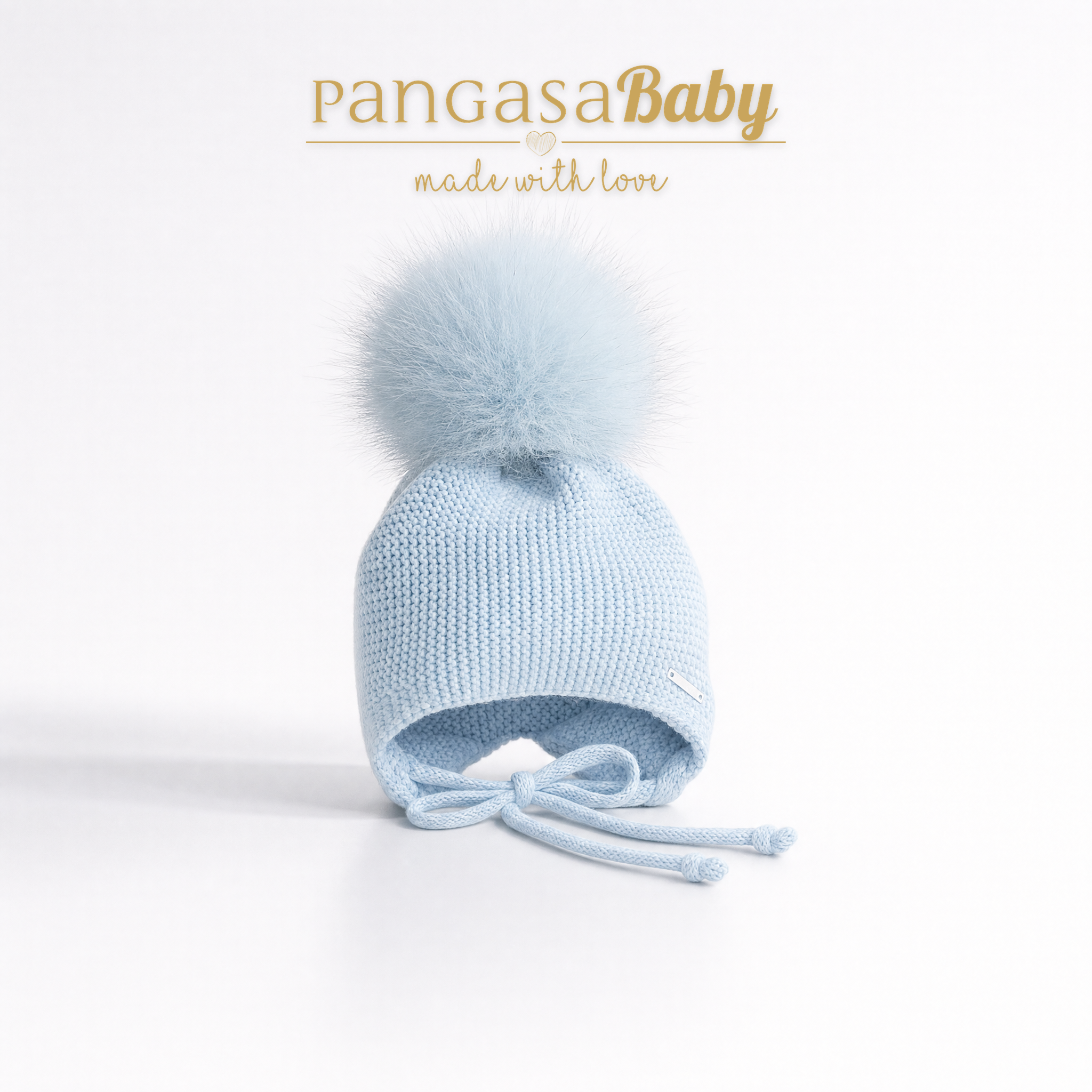 Gorro orejero Pompón Celeste Empolvado Pangasa